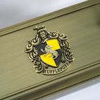 The Noble Collection Harry Potter toverstaf standaard hufflepuff 20 cm goudkleurig – toverstafhouder
