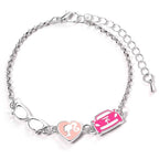 The Carat Shop – barbie – bedelarmband met drie klassieke bedels – barbie – bril en roze auto